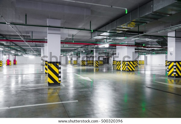Empty underground parking\
garage