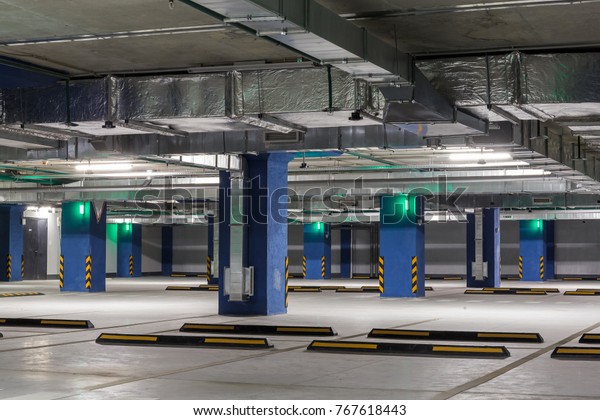 Empty underground parking or garage interior city\
car infrastructure, toned