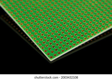 Empty universal printed circuit board PCB with drilled holed for elctronics component and prototyping