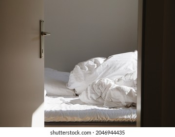 Empty Unmade Bed In The Morning