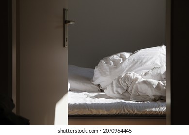 Empty Unmade Bed In The Morning