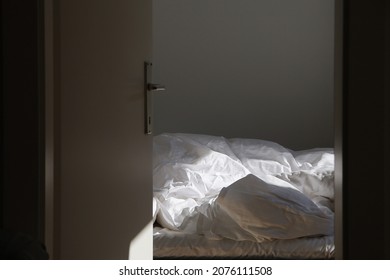 Empty Unmade Bed In The Morning