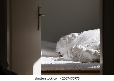 Empty Unmade Bed In The Morning	