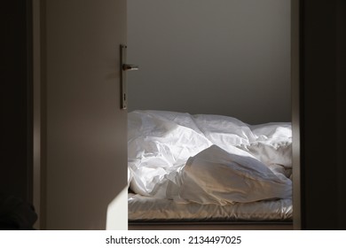 Empty Unmade Bed In The Morning