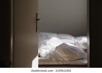 Empty Unmade Bed In The Morning