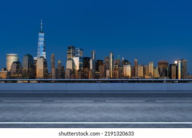 Empty Urban Asphalt Road Exterior With City Buildings Background. New Modern Highway Concrete Construction. Concept Of Way To Success. Transportation Logistic Industry Fast Delivery. New York. USA.