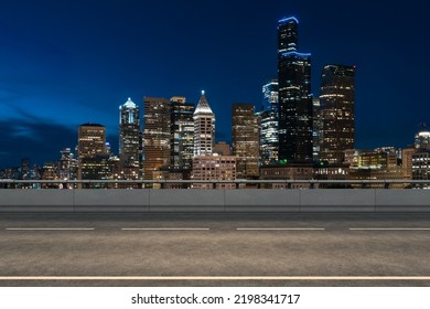 Empty Urban Asphalt Road Exterior With City Buildings Background. New Modern Highway Concrete Construction. Concept Way To Success. Transportation Logistic Industry Fast Delivery. Seattle. USA.