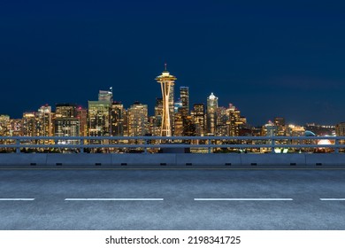 Empty Urban Asphalt Road Exterior With City Buildings Background. New Modern Highway Concrete Construction. Concept Way To Success. Transportation Logistic Industry Fast Delivery. Seattle. USA.