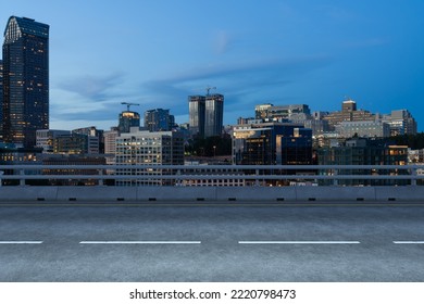 Empty Urban Asphalt Road Exterior With City Buildings Background. New Modern Highway Concrete Construction. Concept Way To Success. Transportation Logistic Industry Fast Delivery. Seattle. USA.