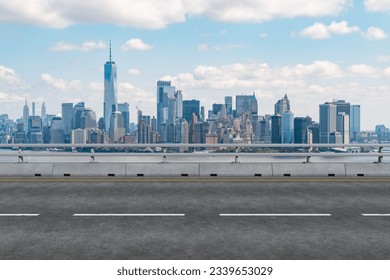 Empty urban asphalt road exterior with city buildings background. New modern highway concrete construction. Concept of way to success. Transportation logistic industry fast delivery. New York. USA. - Powered by Shutterstock