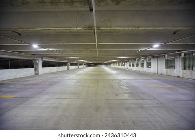 Empty Urban Parking Garage with Fluorescent Lighting, Symmetrical Perspective - Powered by Shutterstock