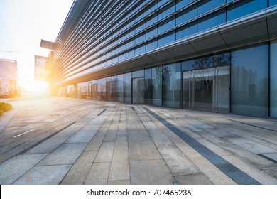 Empty Urban Road Near Modern Building Exterior