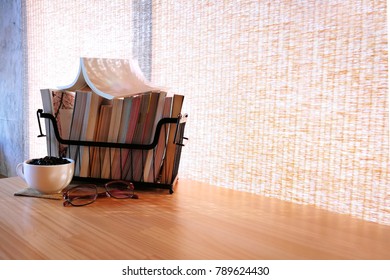 Empty use put text .books in basket on wood table 