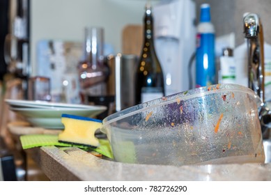 Empty Used Dirty Plastic Food Container Box In Kitchen Washing Sink