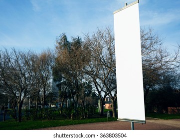 Empty vertical banner on the city square. 