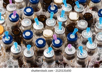 Empty Vials Of Drugs. Medical Garbage. Raw Materials For Processing. Biologically Contagious Items