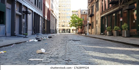 Empty View Of Crobsy Street Covered With Trash In The NoHo Neighborhood Of Manhattan In New York City NYC