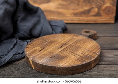 Empty Vintage Cutting Board On Dark Wooden Planks Food Background Concept