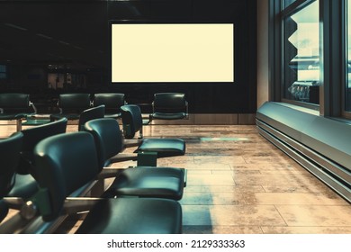 An Empty Waiting Room Of A Modern Airport With A Mockup Of A Blank LCD Flight Schedule Screen; A Hall Of A Contemporary Terminal With A Template Of An Advertising Plasma Tv Nest To The Row Of Seats