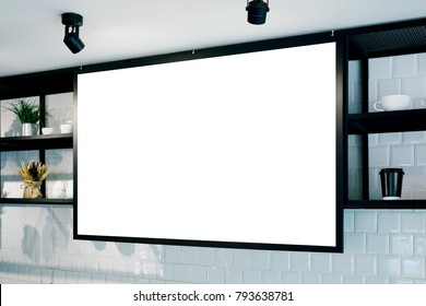 Empty Wall Banner At Cafe Mockup, Side View. Coffe Cups And Plants On Shelf In Background. Scandinavian Interior Design. Text Space 