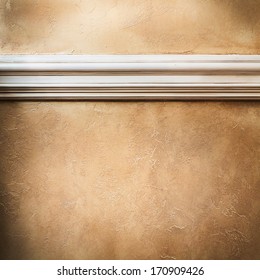 Empty wall with white molding