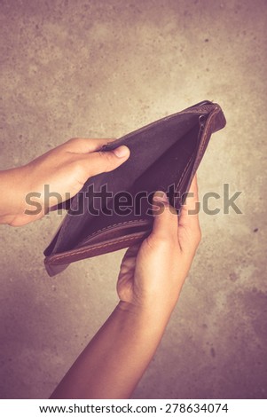 An empty wallet with filter effect retro vintage style