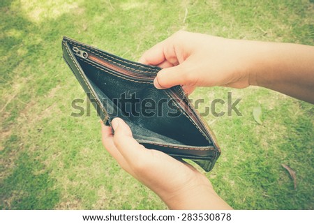 An empty wallet with filter effect retro vintage style