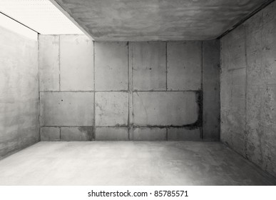 Empty Warehouse Room With Concrete Walls And Floor.