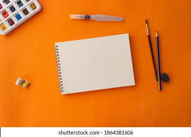 Empty watercolor paper isolated on orange background. Watercolor brush. Set of watercolor. - Powered by Shutterstock