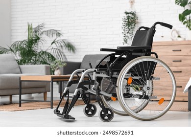 Empty wheelchair in living room