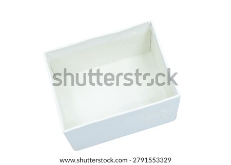 Empty white cardboard box with a square shape and clean interior surfaces. Useful packaging material for shipping gifts products or retail storage isolated studio shot.