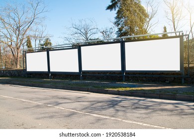 Empty white horizontal billboards for mock up on the roadside. - Shutterstock ID 1920538184