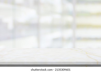 Empty White Marble Counter Top With Blur Pharmacy Drugstore Shelves Background