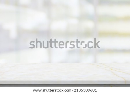Empty white marble counter top with blur pharmacy drugstore shelves background