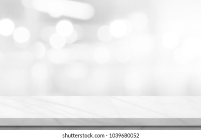 Empty white marble over blur background, for your photo montage or product display, Space for placing items on the table, product and food display.