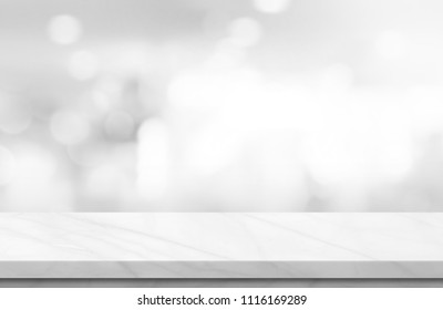 Empty White Marble Over Blur Background, For Your Photo Montage Or Product Display, Space For Placing Items On The Table, Product And Food Display.