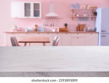 Empty white marble table in beautiful kitchen. Space for design