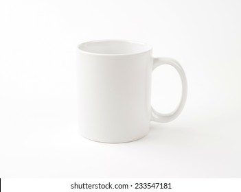 empty white mug on white background