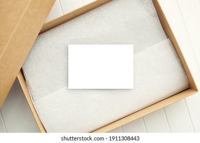 Empty White Paper Card Mockup For Design, Business, Shop Or Gift Card In Brown Box, Space For Text.             