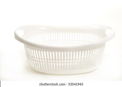 Empty White Plastic Laundry Basket On White