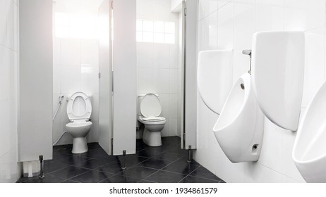 Empty white public bathroom concept 