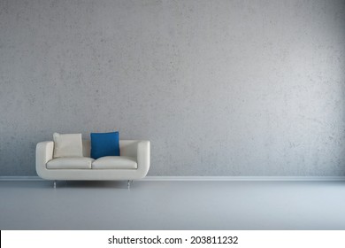 Empty white room with leather loveseat and concrete wall - Powered by Shutterstock