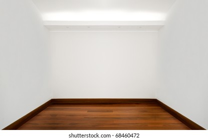 Empty White Room With Wooden Floor