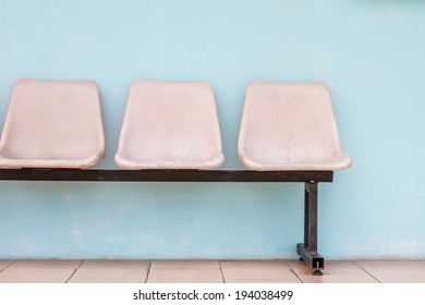 empty white row of chairs