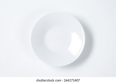 Empty White Saucer On White Background