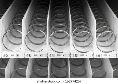 Empty White Shelf Of Standard Office Vending Machine