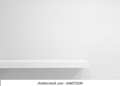 Empty White Shop Shelf, Retail Shelf On White Vintage Background.