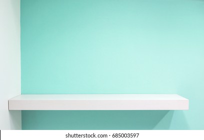 Empty white shop shelf, retail shelf on blue sky vintage background. - Shutterstock ID 685003597