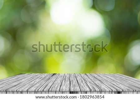 Similar – Moos auf einer Holztafel in der Umgebung eines Waldes