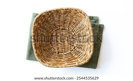 Empty wicker basket on a white background. Top view.